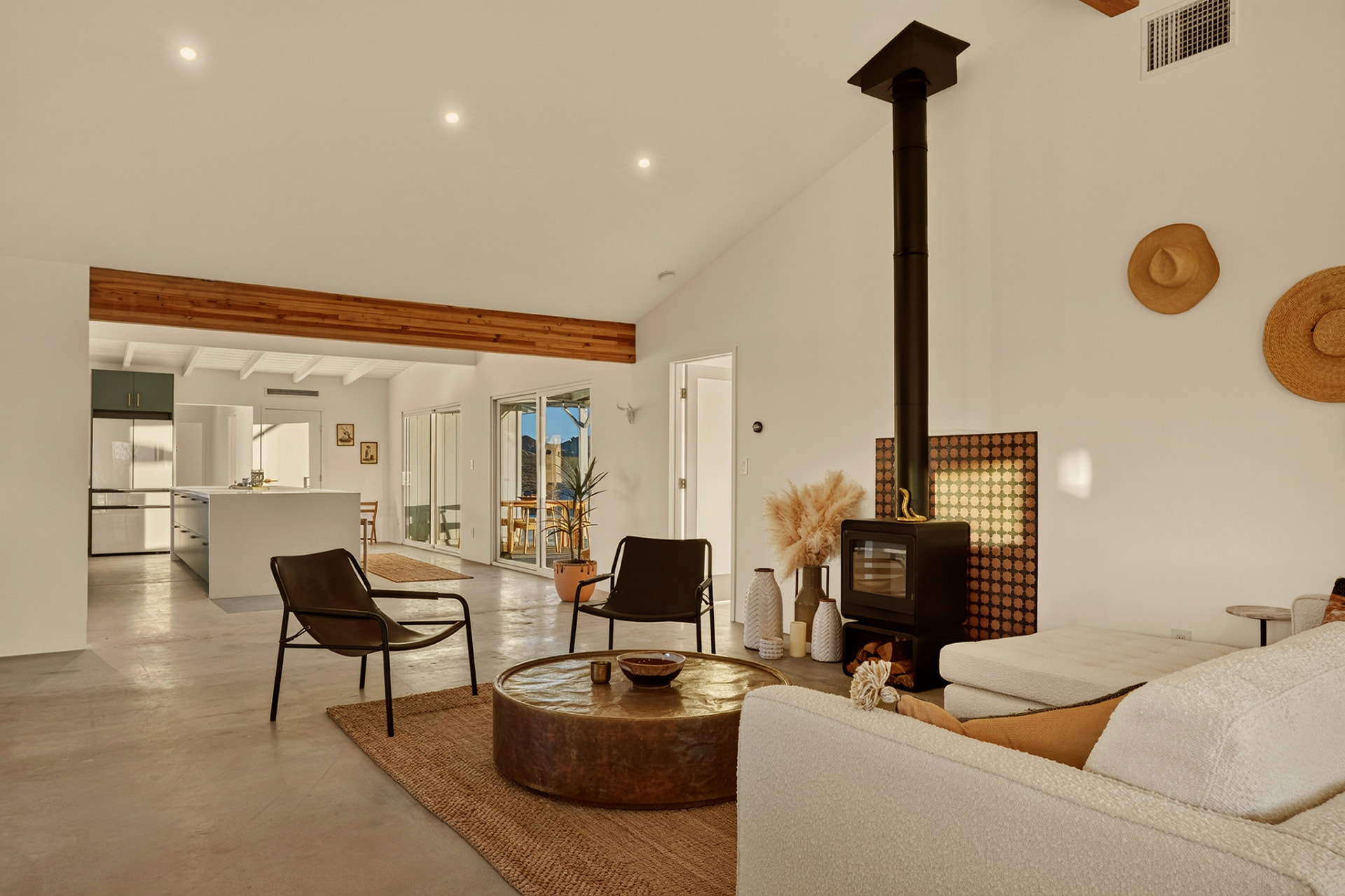 Living room with pool view through sliding doors